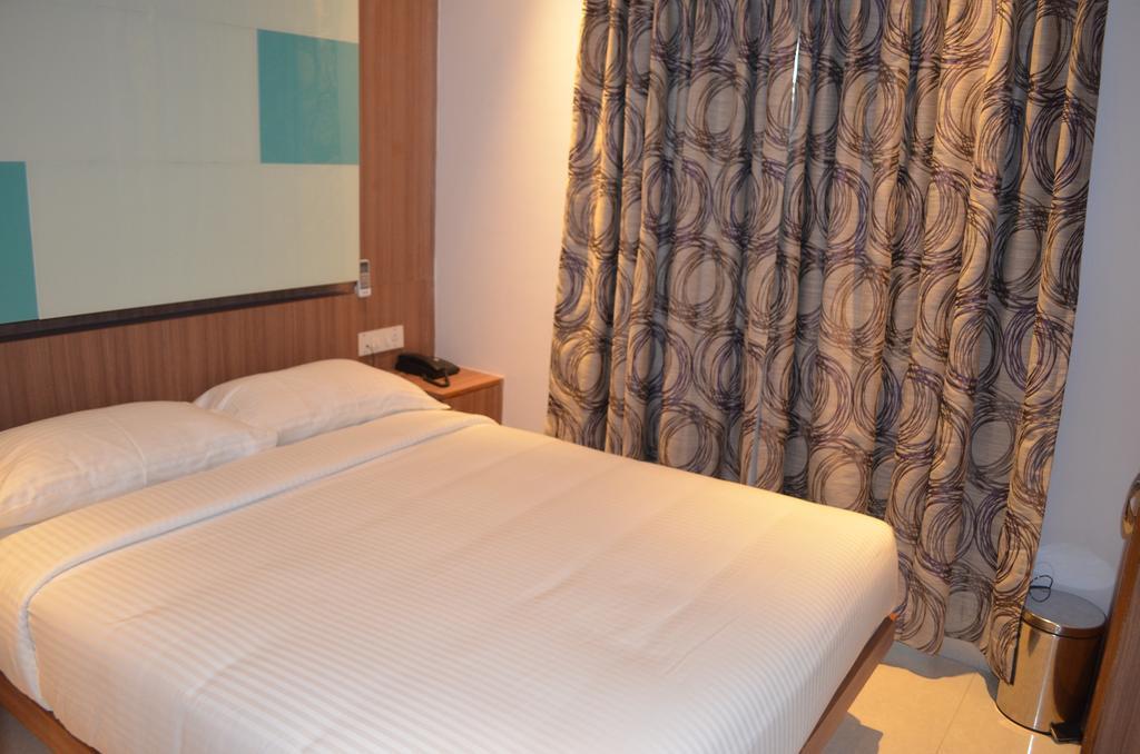 Itsy Hotels Hiland Suites Bangalore Rum bild